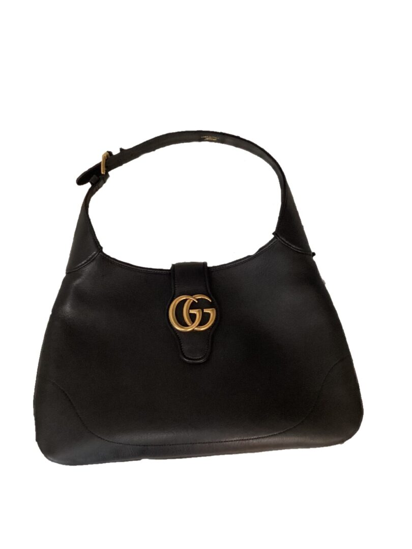 Pre-Owned Gucci Aphrodite Shoulder Bag with a gold gg logo clasp, isolated on a white background.